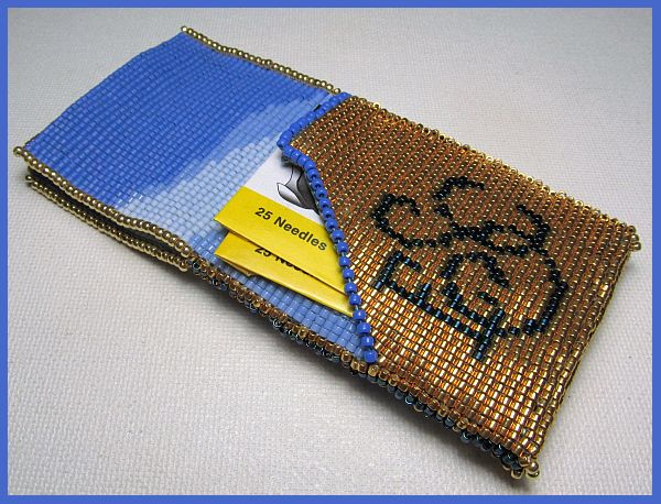 Side one of needle case