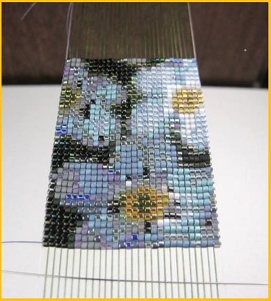 The bead colors shine with a white weft!
