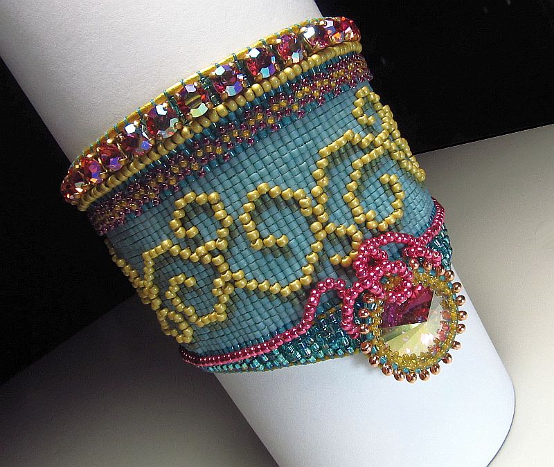 11/0 Japanese Seed Beads and 11/0 Delicas intertwined on a loom