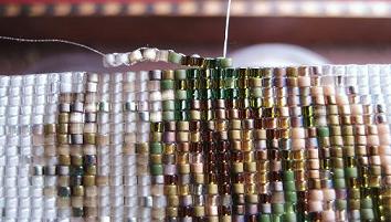 Continuing a design, off loom