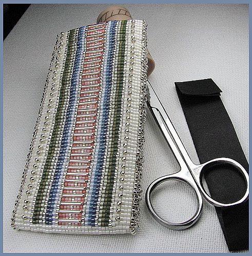 Side one of needle case