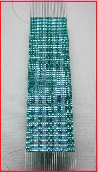 Base of cuff on the loom