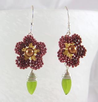 Red permanent Toho seed bead flowers with glass leaf dangle